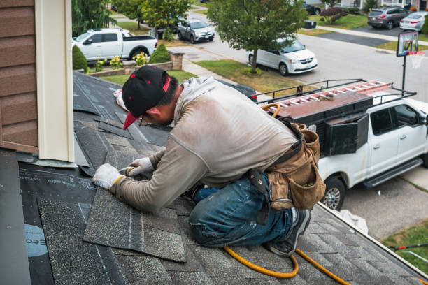 Professional Roofing technician working in Hebron, MD